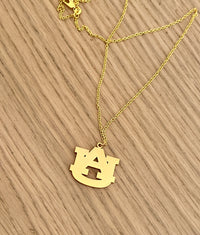 Gold Auburn logo necklace, product view